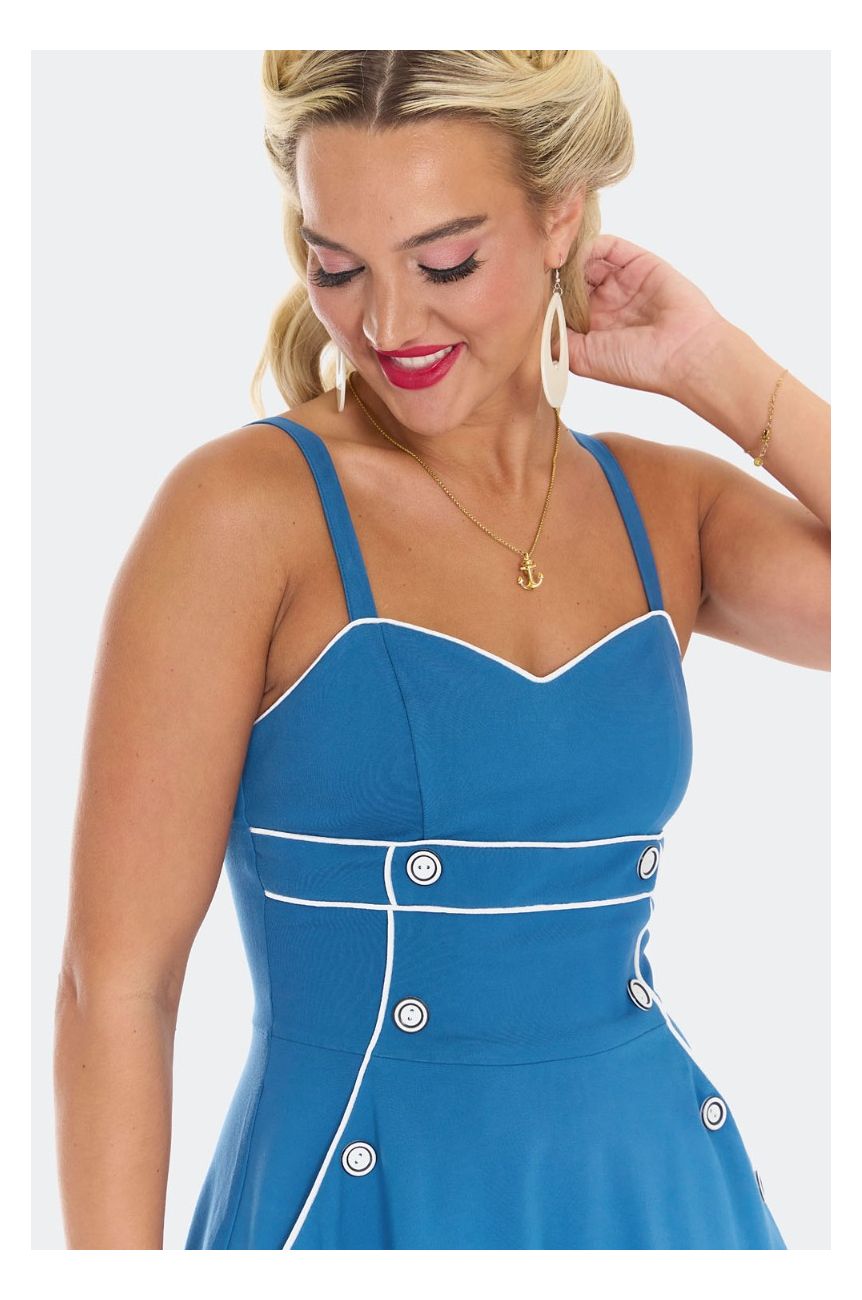 Robe vintage bleu marine liseres blancs bretelles boutons nautique elegant