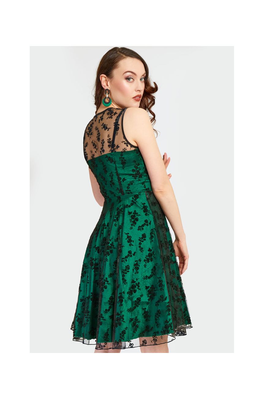 Robe annees 1950 vert forêt dentelle noire design illusion elegant