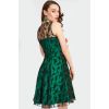 Robe annees 1950 vert forêt dentelle noire design illusion elegant