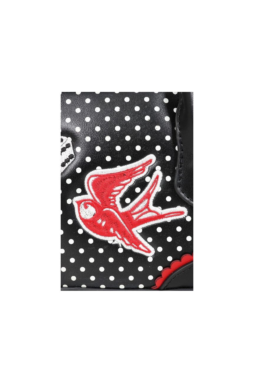 Sac bowling pin-up noir pois blancs, anses doubles rigides et liseré rouge contrasté, accessoire vintage rockabilly années 50